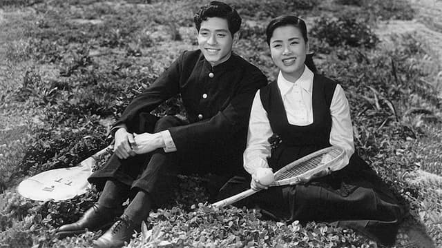 Youth’s Romance Seat: Sitting on the Green Grass
