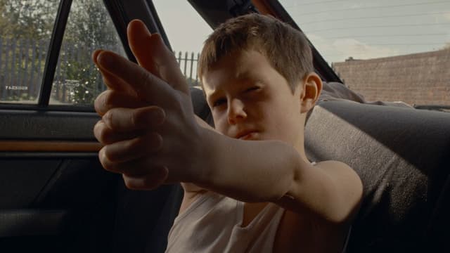 Boy in the Back Seat